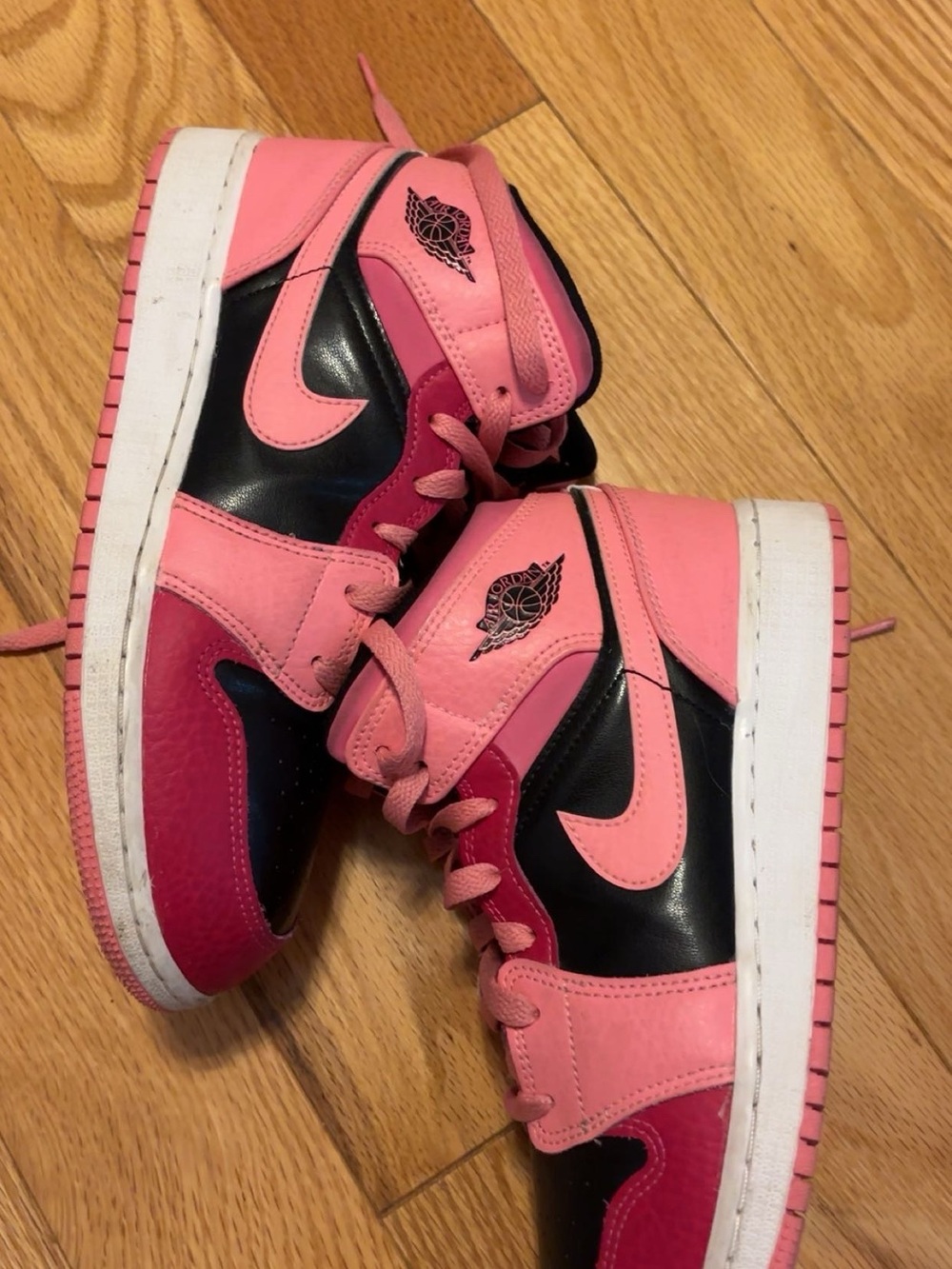 Nike Women's Pink and Black Air Jordan 1 Mid Athletic Shoes